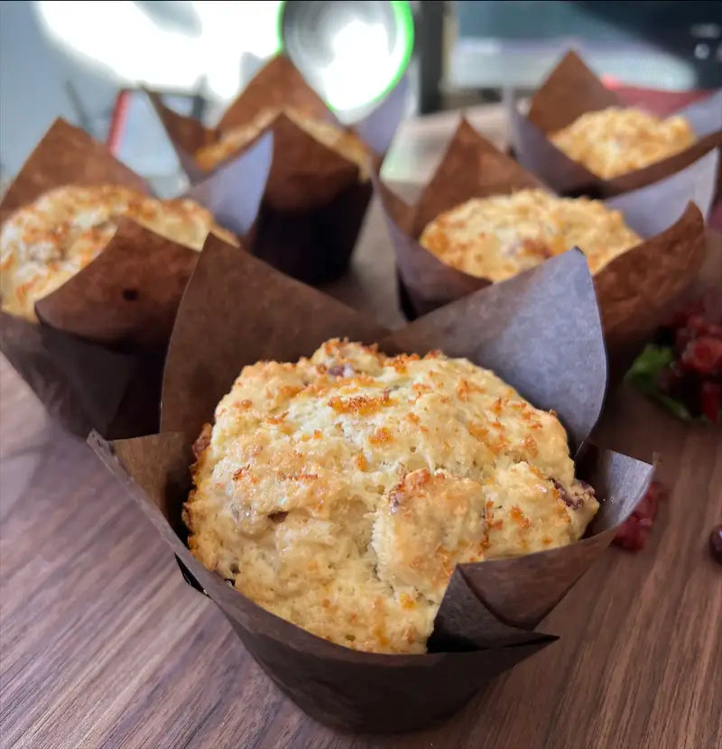 Artisan style lemon cranberry muffins with a rustic finish, highlighting the homemade quality at Mimi Delights in Ottawa.