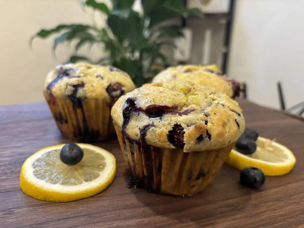 decorated_blueberry_lemon_muffins_on_wooden table_2