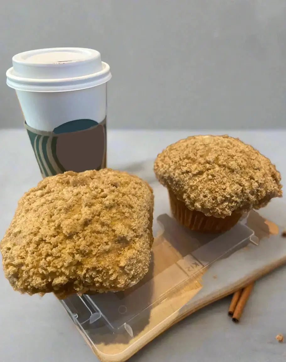 two__delicious_cinnamon_raisin_muffins_and_coffee_cup