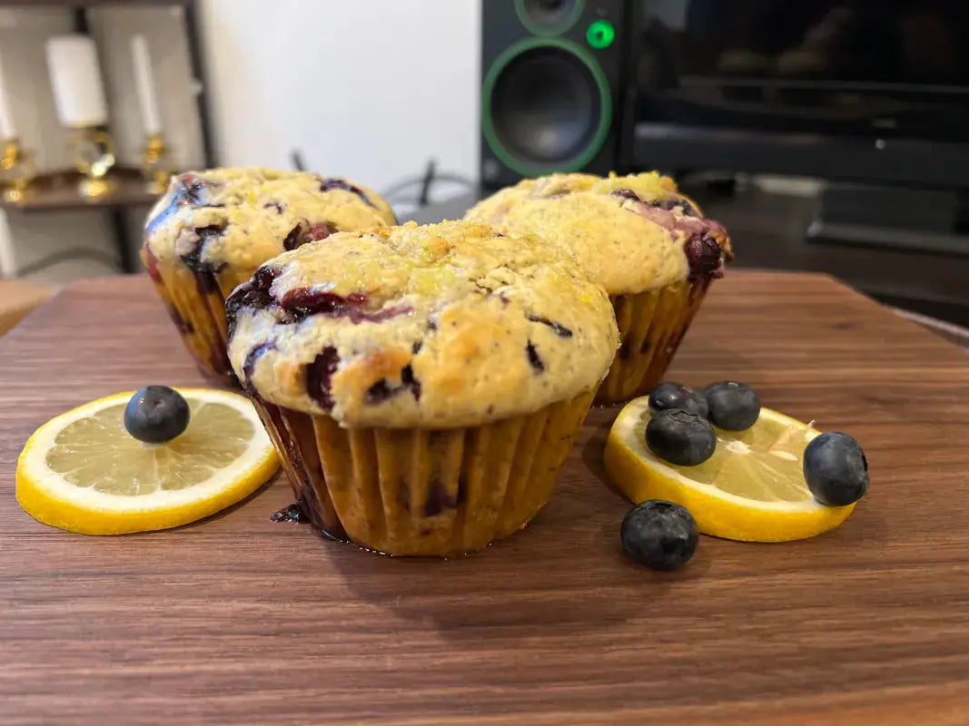 decorated_with_lemons_blueberry_lemon_poppy_seed_muffins_on_powdered_surface_1b
