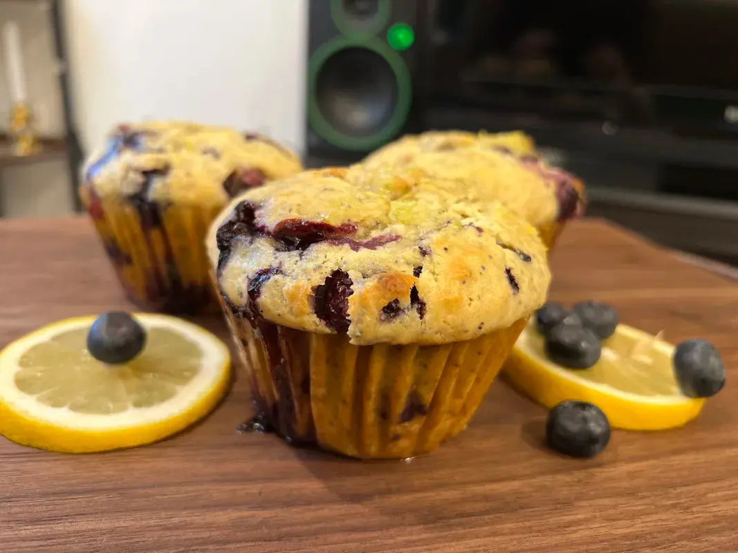 decorated_with_lemons_blueberry_lemon_poppy_seed_muffins_on_powdered_surface_2
