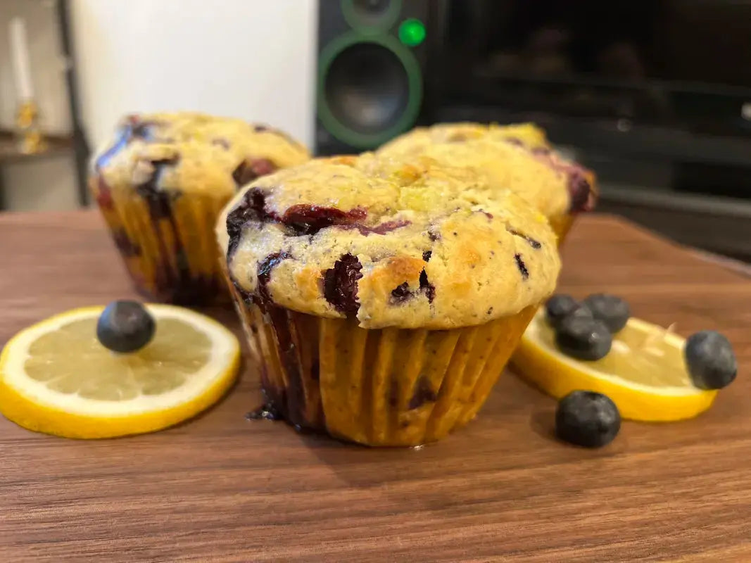 decorated_with_2_slices_of_lemon_blueberry_lemon_poppy_seed_muffins_on_powdered_surface_6